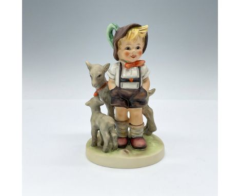 Hand-painted figurine depicting a boy with his goats. Goebel TMK5. Issued: 1972-1979Dimensions: 3.5"L x 3"W x 5.25"HManufactu