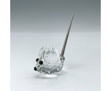 This mouse, a clear crystal figure with black crystal eyes and nose, complemented by a metal spring coil tail, was also an or