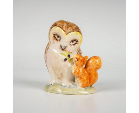 Hand painted glossy owl figurine colored in soft brown, cream and green. Standing beside a small brown squirrel. Beswick back