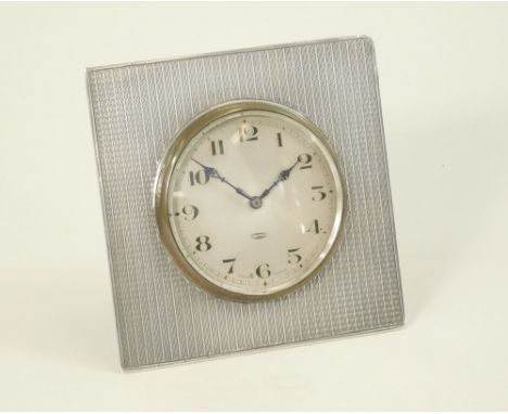 STRUT CLOCK. An Art Deco engine turned strut clock. Birmingham 1927 with Swiss eight-day movement. 8 x 8cm.