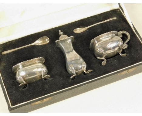 CRUET SET. A Chinese 935 standard Sterling silver cruet set, cased. All pieces stamped.