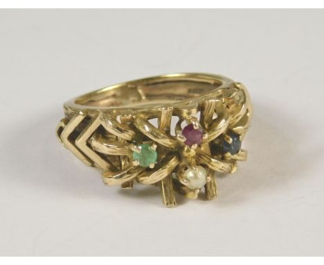 GOLD RING. A 9ct. gold modern ring set with three gem stones &amp; a cultured pearl. Size K/L.