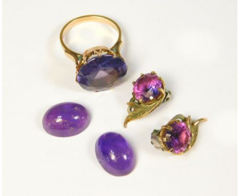 AMETHYST. Two unmounted cabouchon amethyst stones, a pair of amethyst ear clips &amp; a 14ct. gold dress ring.