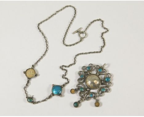 ARTS & CRAFTS ENAMEL. An Arts & Crafts enamel necklace, the large silver drop scroll & bead design, set throughout with turqu