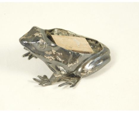 PIN CUSHION. A silver frog pin cushion, Birmingham 1912 (lacks cushion).