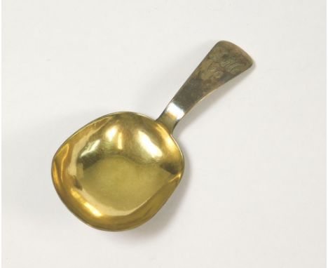 CADDY SPOON. A small George III silver gilt caddy spoon, by Joseph Taylor. Birmingham 1808.