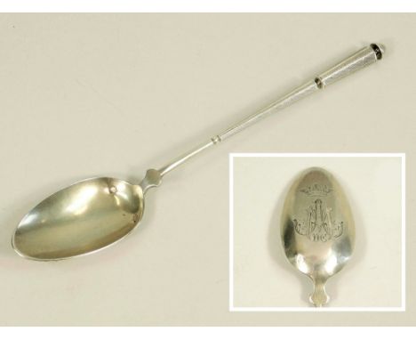 FRENCH SILVER. An early 20th century French silver gilt spoon with tapering engine turned stem. The reverse of the bowl engra