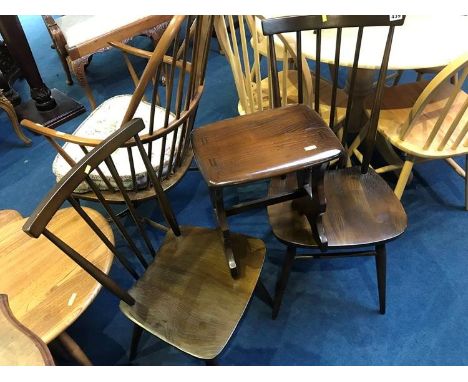 Two Ercol chairs and a small Ercol table