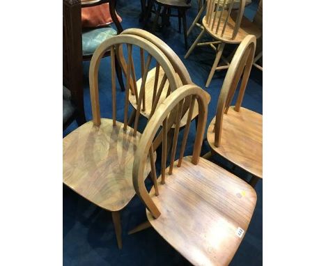 A set of four Ercol hooped back chairs
