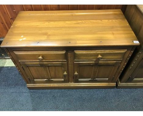 An Ercol two drawer dresser base, 98cm wide