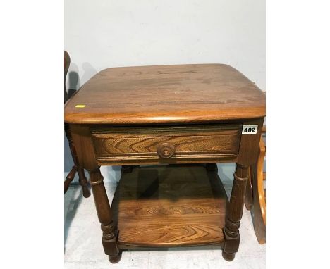 A small Ercol single drawer side table, 47cm wide