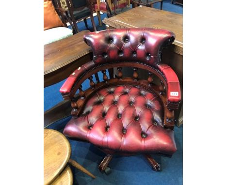 A leather Chesterfield button back office chair