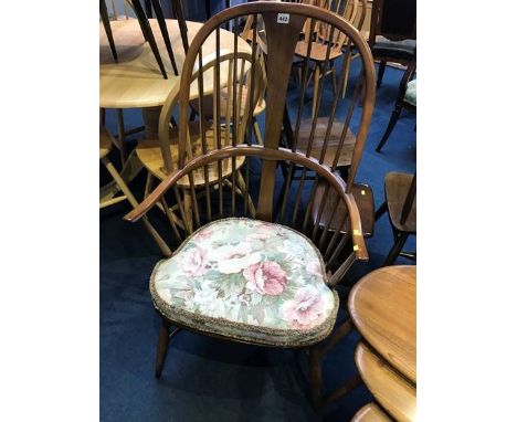 An Ercol spindle back armchair