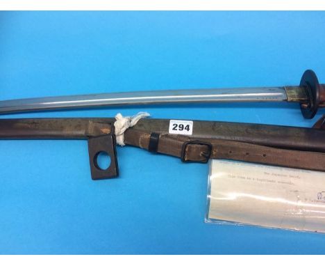 A Japanese NCO Shin Gunto with metal scabbard, together with a note certifying it as 'A legitimate souvenir' dated Nov 5th 19