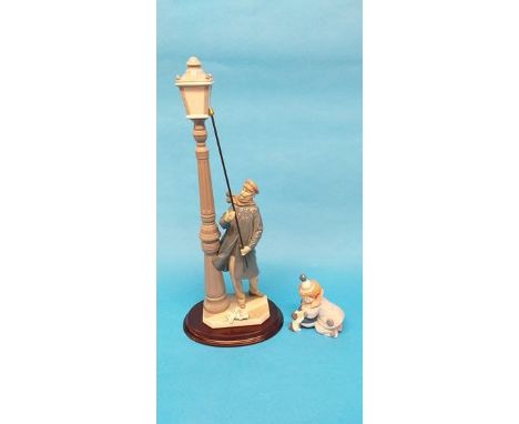 A Lladro figure 'Lamp Lighter', numbered 5205 and a Clown