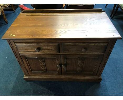 An Ercol two door side cabinet, 96cm wide