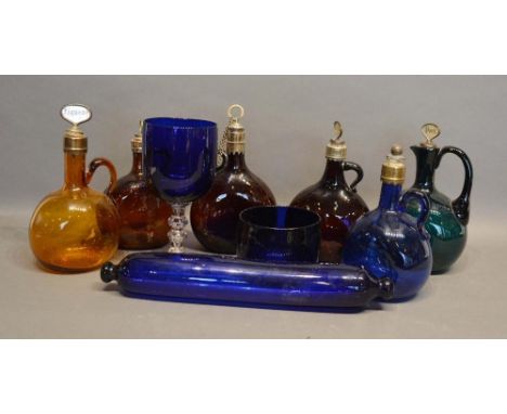 A Collection of Six Coloured Glass Decanters, together with a Bristol blue glass rolling pin and two other similar items 