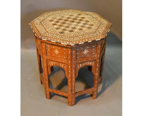 A Moorish Inlaid Octagonal Occasional Table with folding stand, 55cm diameter 