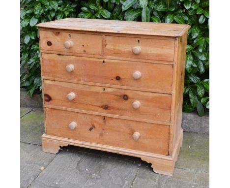 A Victorian Pine Straight front Chest of Drawers, the moulded top above two short and three long drawers with knob handles ra