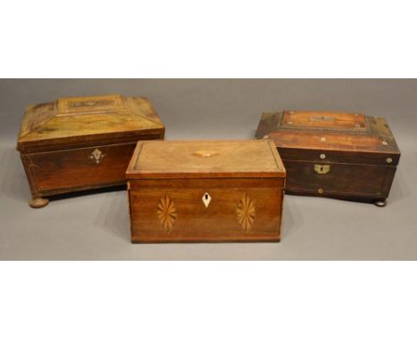 A Victorian Rosewood and Mother of Pearl Inlaid Workbox, together with another similar and a mahogany tea caddy 