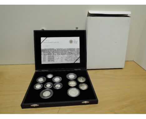 A Royal Mint Limited Edition 2009 Silver Proof Coin Set including Kew Gardens 50p, 12 coins in total, all in plastic capsules