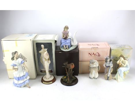 A collection of Nao and other ceramic figures. To include a child playing a cello, large figure of a dancer, etc, in original