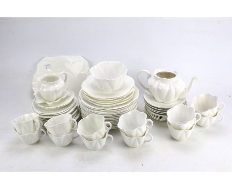 A 20th century plain white Shelley Dainty design, white in colour, red number 272101, to include tea cups, saucers, side plat