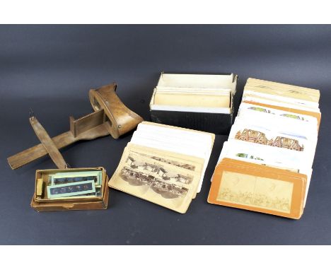 A Perfecscope stereoscopic viewer, cards and magic lantern slides. The cards including religious scenes, images of America an