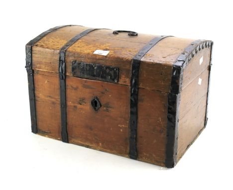 A small metal bound dome topped pine trunk. Measuring approximately L45cm x D31cm x H30cm