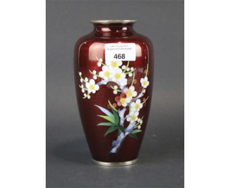 A Japanese guilloche enamel baluster vase. Decorated with flowering prunus on a deep red ground, H18.5cm