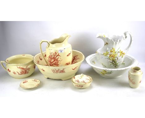 A John Maddock &amp; Sons pitcher and basin and a ceramic wash set. The pitcher and basin decorated with flowers, the wash se