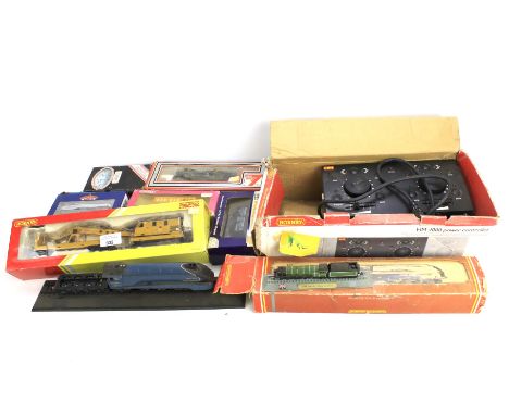 A collection of OO gauge locomotives, rolling stock and related items. Including Hornby and Lima examples, some in the origin