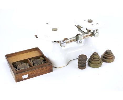 A set of Fairbanks white ceramic scales and two sets of vintage weights.
