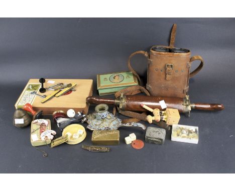 An assortment of collectables. Including a Victorian ceramic pot lid, oriental pewter box, bone pen knife, bank notes etc