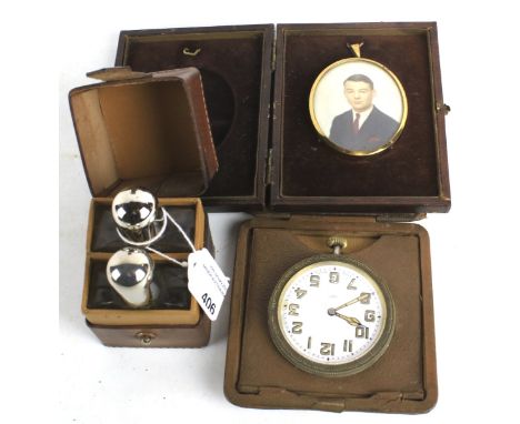 A boxed vintage scent bottle set, travelling clock and portrait miniature. The travelling clock in a leather case, the portra