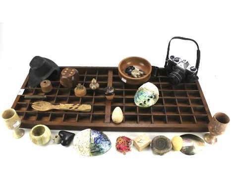 A collection of assorted treen and soapstone collectables. To include two beakers, abalone mother of pearl shells, wooden dic