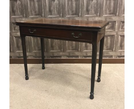 GEORGE III MAHOGANY OBLONG FOLD OVER TEA TABLE of Hepplewhite design, the top with moulded edge, long frieze drawer, on attra