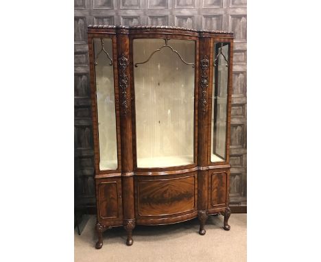 ATTRACTIVE MAHOGANY DISPLAY CABINET OF CHIPPENDALE DESIGN the top with knulled border, two glazed shelves below enclosed by a