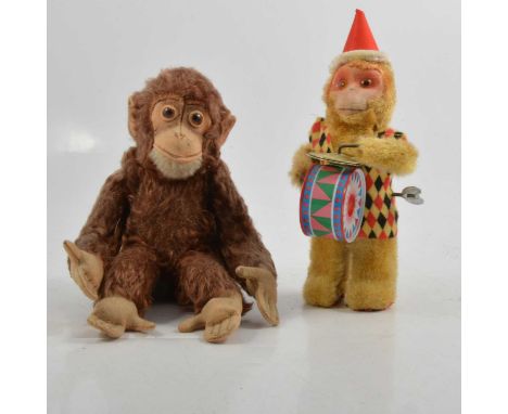 Steiff Germany monkey toy, 28cm, jointed limbs, glass eyes (missing ear button); and a wind-up monkey toy with tin-plate drum