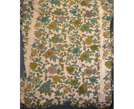 Vintage bed throw, embroidered with scrolling flowers and foliage.