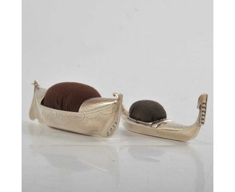 Silver novelty pin cushion, designed as a rowing boat, D &amp; J Wellby Ltd, London 1937, length 10.5cm; another, modelled as