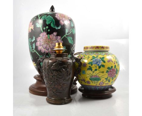 Modern yellow ground famille rose jar, on stand, 22cm overall; famille noir covered jar; and Chinese bronze vase, converted a