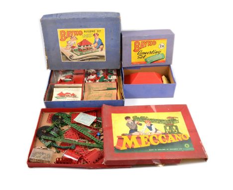 A quantity of Meccano parts, red and green, in a no.4 box; along with two Bayko sets no.2 and no.2X converting set, both boxe