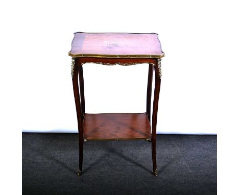 French walnut and kingwood table, rectangular serpentine top with marquetry and parquetry inlay, cabriole legs joined by a sh