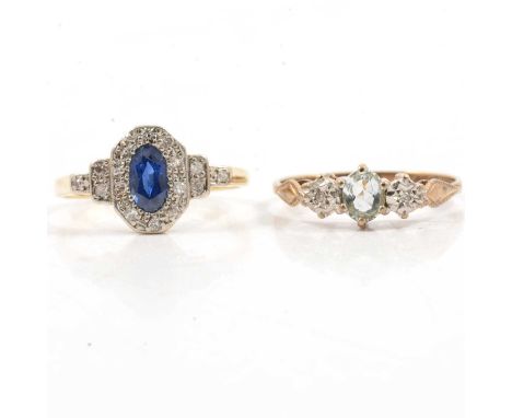 A sapphire and diamond oval cluster ring, the oval mixed cut sapphire pip set and surrounded by ten brilliant cut diamonds, w