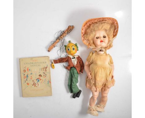 Pedigree Delite walking doll in original box (a/f), Pelham Puppet Mr Turnip, boxed and the BBC Children's Hour Annual.