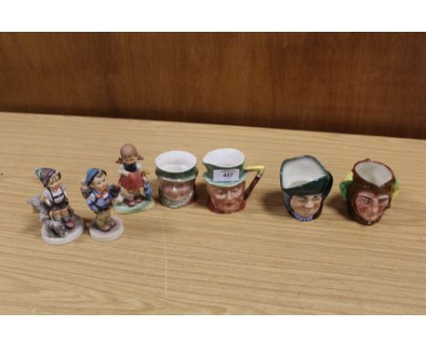 FOUR BESWICK AND ROYAL DOULTON CHARACTER JUGS TOGETHER WITH TWO GOEBEL FIGURES AND ANOTHER (7)