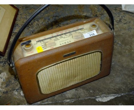 A VINTAGE DYNOTRON NOMAD PORTABLE RADIO 