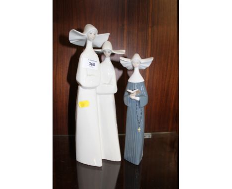 A LLADRO 5500 FIGURE OF A NUN TOGETHER WITH A LARGER NAO FIGURE OF TWO NUNS (2)