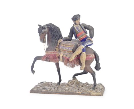 Jose Cubero (Spanish, 1818-1877): A cold painted terracotta equestrian group depicting an Andalusian horsemancirca 1870the fi